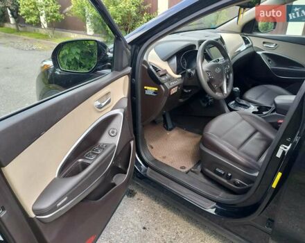 Черный Хендай Санта Фе, объемом двигателя 2.36 л и пробегом 130 тыс. км за 17500 $, фото 4 на Automoto.ua