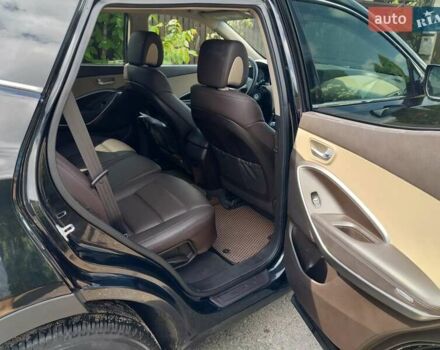 Черный Хендай Санта Фе, объемом двигателя 2.36 л и пробегом 130 тыс. км за 17500 $, фото 7 на Automoto.ua