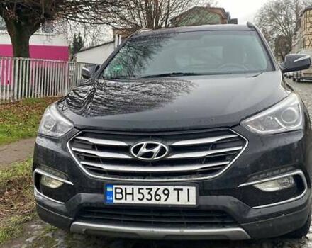 Чорний Хендай Санта Фе, об'ємом двигуна 2 л та пробігом 84 тис. км за 19446 $, фото 1 на Automoto.ua