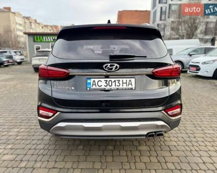 Чорний Хендай Санта Фе, об'ємом двигуна 2 л та пробігом 77 тис. км за 28500 $, фото 7 на Automoto.ua