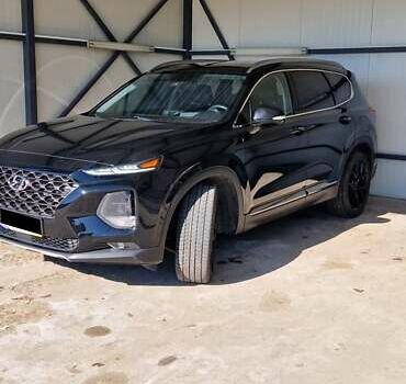 Черный Хендай Санта Фе, объемом двигателя 2.36 л и пробегом 152 тыс. км за 23700 $, фото 2 на Automoto.ua