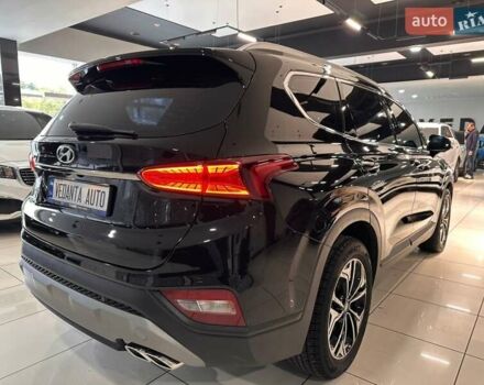 Чорний Хендай Санта Фе, об'ємом двигуна 2 л та пробігом 77 тис. км за 27500 $, фото 3 на Automoto.ua