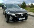 Чорний Хендай Санта Фе, об'ємом двигуна 2.4 л та пробігом 99 тис. км за 25000 $, фото 1 на Automoto.ua