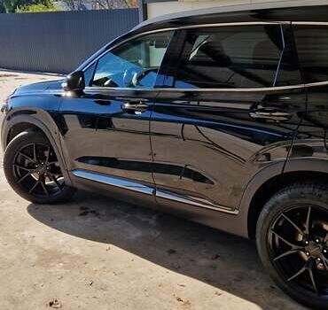 Черный Хендай Санта Фе, объемом двигателя 2.36 л и пробегом 152 тыс. км за 23700 $, фото 1 на Automoto.ua