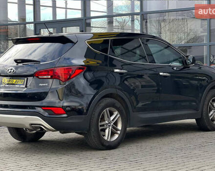 Черный Хендай Санта Фе, объемом двигателя 2.36 л и пробегом 130 тыс. км за 16300 $, фото 4 на Automoto.ua