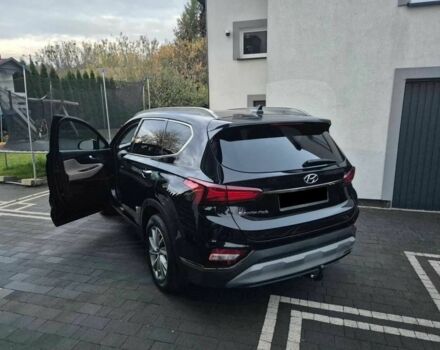 Черный Хендай Санта Фе, объемом двигателя 2.4 л и пробегом 105 тыс. км за 11200 $, фото 2 на Automoto.ua