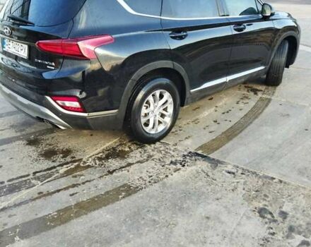 Чорний Хендай Санта Фе, об'ємом двигуна 2.4 л та пробігом 100 тис. км за 25000 $, фото 4 на Automoto.ua