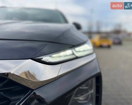 Чорний Хендай Санта Фе, об'ємом двигуна 2 л та пробігом 77 тис. км за 28500 $, фото 4 на Automoto.ua