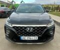 Чорний Хендай Санта Фе, об'ємом двигуна 2.4 л та пробігом 99 тис. км за 25000 $, фото 1 на Automoto.ua