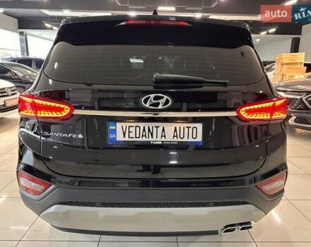 Чорний Хендай Санта Фе, об'ємом двигуна 2 л та пробігом 77 тис. км за 27500 $, фото 4 на Automoto.ua