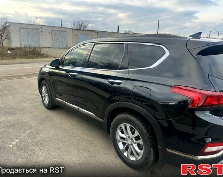 Чорний Хендай Санта Фе, об'ємом двигуна 2.4 л та пробігом 99 тис. км за 25000 $, фото 4 на Automoto.ua