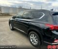 Чорний Хендай Санта Фе, об'ємом двигуна 2.4 л та пробігом 99 тис. км за 25000 $, фото 4 на Automoto.ua