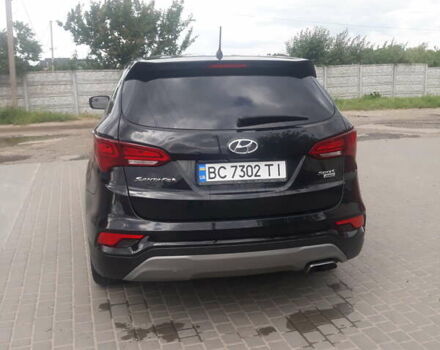 Черный Хендай Санта Фе, объемом двигателя 2.36 л и пробегом 125 тыс. км за 16700 $, фото 1 на Automoto.ua