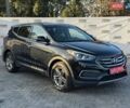 Черный Хендай Санта Фе, объемом двигателя 2.4 л и пробегом 190 тыс. км за 11700 $, фото 1 на Automoto.ua