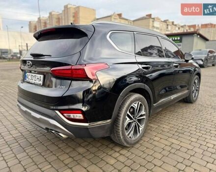 Чорний Хендай Санта Фе, об'ємом двигуна 2 л та пробігом 77 тис. км за 28500 $, фото 9 на Automoto.ua