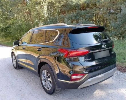 Черный Хендай Санта Фе, объемом двигателя 2.4 л и пробегом 106 тыс. км за 11999 $, фото 1 на Automoto.ua