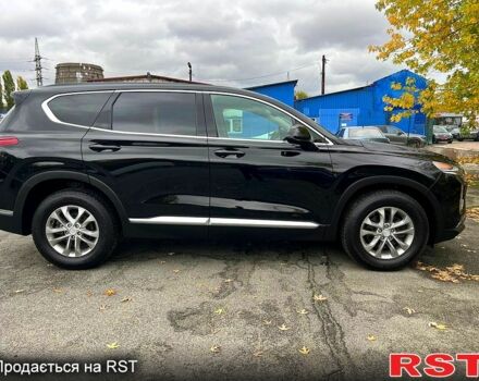 Чорний Хендай Санта Фе, об'ємом двигуна 2.4 л та пробігом 150 тис. км за 19900 $, фото 7 на Automoto.ua