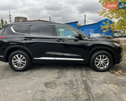 Черный Хендай Санта Фе, объемом двигателя 2.36 л и пробегом 150 тыс. км за 19900 $, фото 6 на Automoto.ua