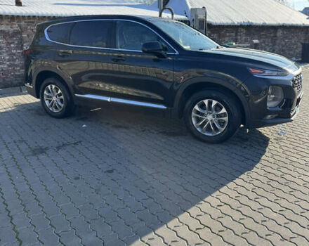 Черный Хендай Санта Фе, объемом двигателя 2.4 л и пробегом 49 тыс. км за 23000 $, фото 4 на Automoto.ua