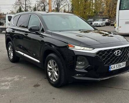 Черный Хендай Санта Фе, объемом двигателя 2.36 л и пробегом 150 тыс. км за 19900 $, фото 2 на Automoto.ua