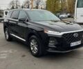 Черный Хендай Санта Фе, объемом двигателя 2.36 л и пробегом 150 тыс. км за 19900 $, фото 2 на Automoto.ua
