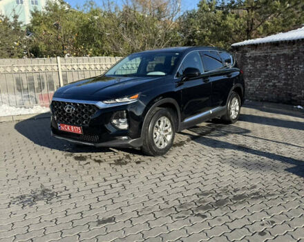 Черный Хендай Санта Фе, объемом двигателя 2.4 л и пробегом 49 тыс. км за 23000 $, фото 1 на Automoto.ua