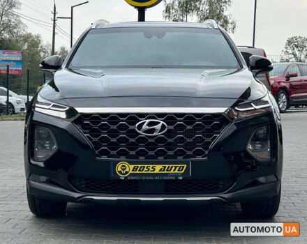 Черный Хендай Санта Фе, объемом двигателя 2 л и пробегом 34 тыс. км за 26000 $, фото 1 на Automoto.ua
