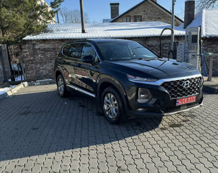 Черный Хендай Санта Фе, объемом двигателя 2.4 л и пробегом 49 тыс. км за 23000 $, фото 2 на Automoto.ua