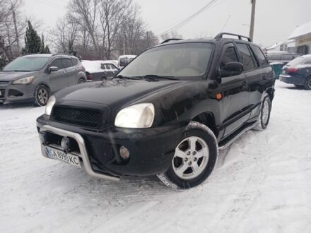 Чорний Хендай Санта Фе, об'ємом двигуна 2.4 л та пробігом 468 тис. км за 4200 $, фото 1 на Automoto.ua