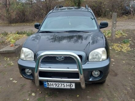 Черный Хендай Санта Фе, объемом двигателя 2.4 л и пробегом 192 тыс. км за 3678 $, фото 1 на Automoto.ua