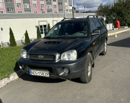Черный Хендай Санта Фе, объемом двигателя 2 л и пробегом 380 тыс. км за 1828 $, фото 1 на Automoto.ua