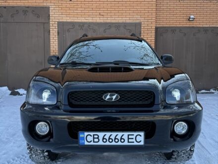 Черный Хендай Санта Фе, объемом двигателя 2 л и пробегом 292 тыс. км за 6666 $, фото 1 на Automoto.ua