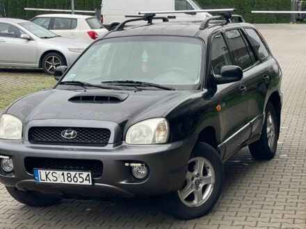 Черный Хендай Санта Фе, объемом двигателя 2 л и пробегом 300 тыс. км за 2925 $, фото 1 на Automoto.ua