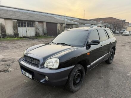 Черный Хендай Санта Фе, объемом двигателя 2 л и пробегом 266 тыс. км за 3200 $, фото 1 на Automoto.ua