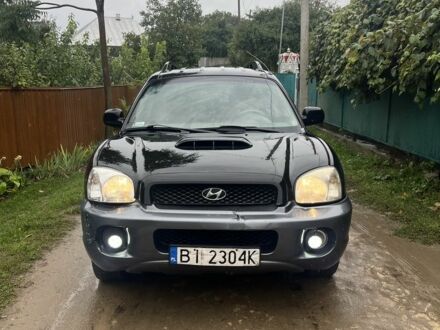 Чорний Хендай Санта Фе, об'ємом двигуна 2 л та пробігом 271 тис. км за 3000 $, фото 1 на Automoto.ua