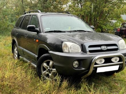 Черный Хендай Санта Фе, объемом двигателя 2 л и пробегом 273 тыс. км за 3800 $, фото 1 на Automoto.ua