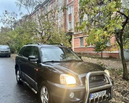 Чорний Хендай Санта Фе, об'ємом двигуна 2 л та пробігом 323 тис. км за 4268 $, фото 1 на Automoto.ua