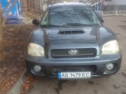 Черный Хендай Санта Фе, объемом двигателя 2 л и пробегом 28 тыс. км за 5500 $, фото 1 на Automoto.ua