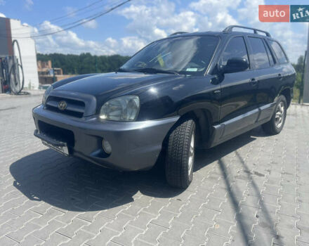 Чорний Хендай Санта Фе, об'ємом двигуна 2.4 л та пробігом 300 тис. км за 5800 $, фото 1 на Automoto.ua