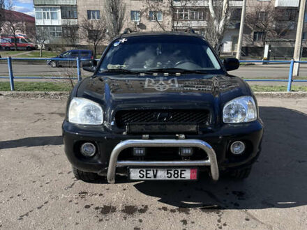Хендай Санта Фе 2005 в Славянске на Automoto.ua Черный Хендай Санта Фе, объемом двигателя 2 л и пробегом 406 тыс. км за 4100 $, фото 1 на Automoto.ua