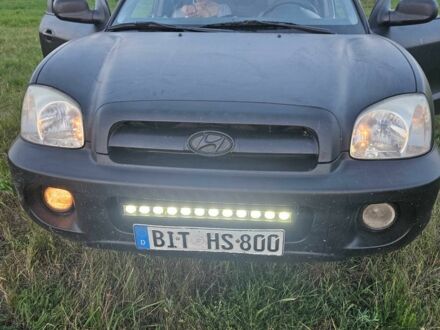 Чорний Хендай Санта Фе, об'ємом двигуна 2 л та пробігом 310 тис. км за 2959 $, фото 1 на Automoto.ua