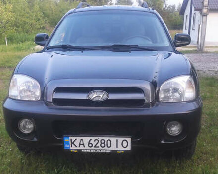 Черный Хендай Санта Фе, объемом двигателя 2.35 л и пробегом 290 тыс. км за 6000 $, фото 1 на Automoto.ua