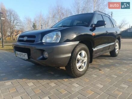 Хендай Санта Фе 2005 в Киеве на Automoto.ua Черный Хендай Санта Фе, объемом двигателя 2.4 л и пробегом 169 тыс. км за 6900 $, фото 1 на Automoto.ua