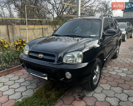 Черный Хендай Санта Фе, объемом двигателя 2.4 л и пробегом 309 тыс. км за 5900 $, фото 1 на Automoto.ua