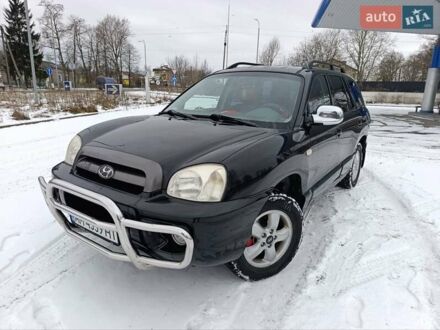 Чорний Хендай Санта Фе, об'ємом двигуна 2.36 л та пробігом 315 тис. км за 5999 $, фото 1 на Automoto.ua