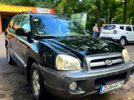 Черный Хендай Санта Фе, объемом двигателя 2 л и пробегом 360 тыс. км за 3800 $, фото 1 на Automoto.ua