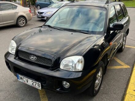 Чорний Хендай Санта Фе, об'ємом двигуна 2 л та пробігом 312 тис. км за 3550 $, фото 1 на Automoto.ua