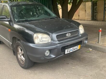 Черный Хендай Санта Фе, объемом двигателя 2 л и пробегом 218 тыс. км за 4200 $, фото 1 на Automoto.ua