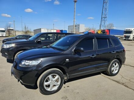 Черный Хендай Санта Фе, объемом двигателя 2.7 л и пробегом 238 тыс. км за 10000 $, фото 1 на Automoto.ua