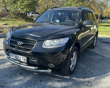 Черный Хендай Санта Фе, объемом двигателя 2.19 л и пробегом 159 тыс. км за 11300 $, фото 1 на Automoto.ua